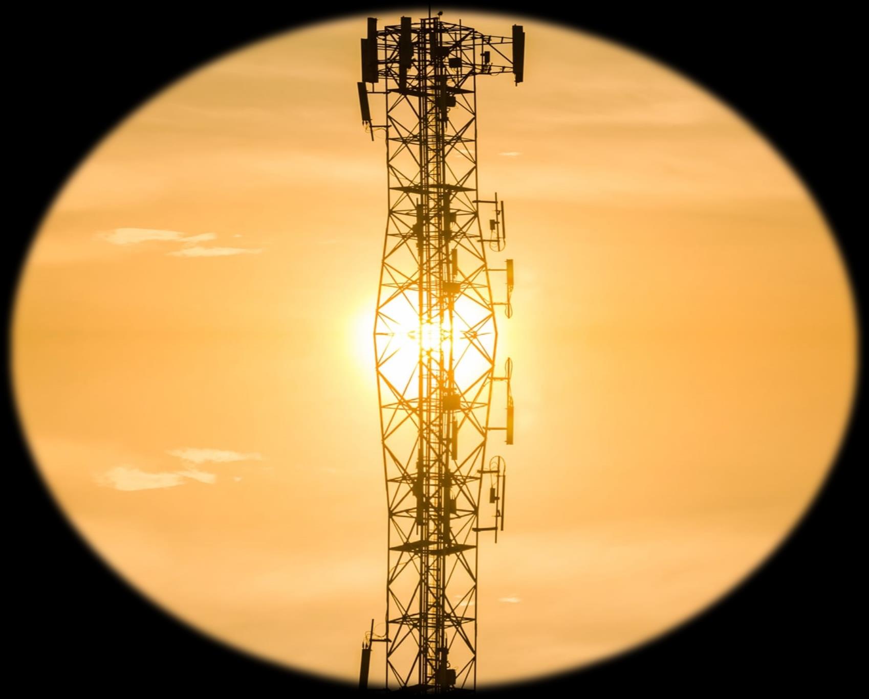 Telecom tower at sunset